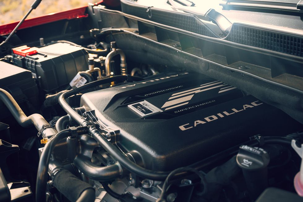 close up of the 2023 cadillac escalade v’s supercharged 62l v 8 engine