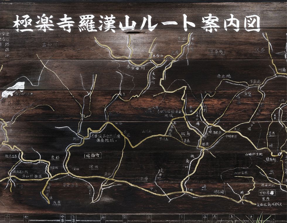 n old sign depicting the network of roads west of the city